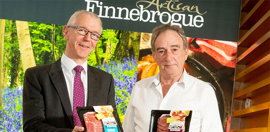 Finnebrogue - Pictured (L-R) are Brian Dolaghan, Executive Director of Business &amp; Sector Development, Invest NI with Denis Lynn, Chairman of Finnebrogue Artisan
