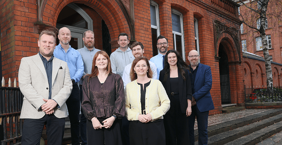 Seven companies are standing with the Minister for the Economy and Susan O'Kane, Invest NI in front of Ormeau Labs