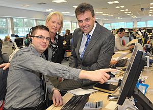 16618-ceo-visits-axa-300x215.jpg