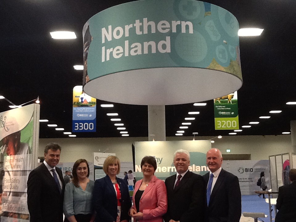 Minister Foster, Alastair Hamilton and members of the ETI Committee at the Invest NI stand, BIO 2014.